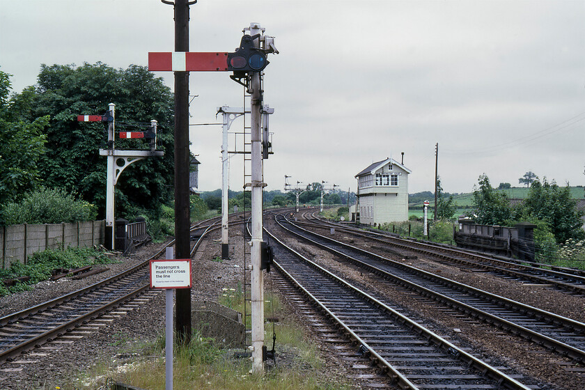 Barnetby East signal box (GC, 1914), from platform end 
 The impressive array of signalling from the eastern end of Barnetby station is now a thing of the past. To the right of the photograph is Barnetby East signal box built by the Great Central Railway in 1914 following the demise of the Manchester, Sheffield & Lincolnshire Railway Company. The superb signalling here and Barnetby and North Lincolnshire as a whole for that matter survived largely intact until Network Rail swept it away during 2016. 
 Keywords: Barnetby East signal box GC from platform end Great Central