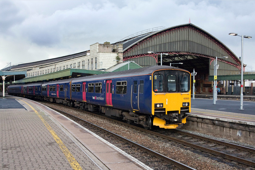 150925 & 153373, GW 12.27 Southampton-Great Malvern (2M98), Bristol Temple Meads station 
 With the recent removal of the Royal Mail conveyor bridge that was linked to the adjacent sorting office the vista at this end of Temple Meads has really been opened up with the end of the train shed is now in full view. The black tarmac to the left of the image marks the footprint of the base of the old sorting office bridge. 150925 and 150373 leave the station working the 2M98 12.27 Southampton to Great Malvern. 
 Keywords: 150925 153373 12.27 Southampton-Great Malvern 2M98 Bristol Temple Meads station