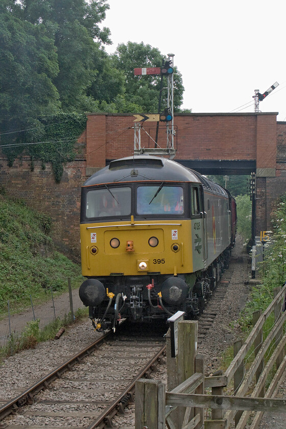 47395, 13.30 Pitsford return, Pitsford station foot crossing 
 Back on the 'mainline' at the Northampton and Lamport Railway after my driver experience, which was confined to the sidings, 47395 works the 13.30 return service. The train is approaching Pitsford and Brampton station with the adjacent cycleway of the popular Brampton Valley Way clearly seen to the left of the train. 
 Keywords: 47395, 13.30 Pitsford return, Pitsford station foot crossing NLR Northampton and Lamport Railway