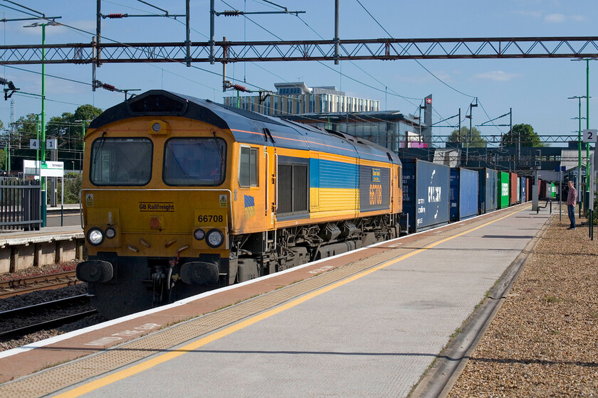 66708, 11.50 Southampton Western Docks-East Midlands Gateway (4M19, 16L), Northampton station 
 Wearing its distinctive one-off livery revealed back on 06.04.22 66708 Glory to Ukraine' leads the diverted 4M19 11.50 Southampton Docks to East Midlands Gateway passes Northampton station in superb late afternoon lighting. If and when the dreadful conflict in the east of Europe comes to some sort of conclusion I hope that GBRf keeps this Class 66 in this livery and named as now if not least as a reminder of the awful mess that nationalism can get us into. 
 Keywords: 66708 11.50 Southampton Western Docks-East Midlands Gateway 4M19 Northampton station GBRf Glory to Ukraine