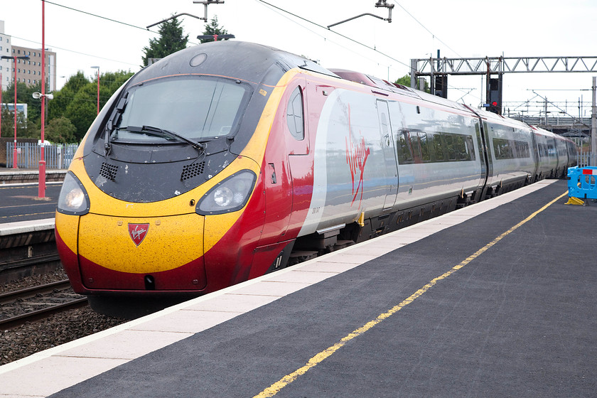 390047, VT 15.50 Birmingham New Street-London Euston (1B64), Birmingham International station 
 The second leg of my journey home from Shrewsbury arrives at Birmingham International station. 390047 arrives into International station with the 15.50 from New Street to Euston that I took this as far as Rugby. 
 Keywords: 390047 15.50 Birmingham New Street-London Euston 1B64 Birmingham International station