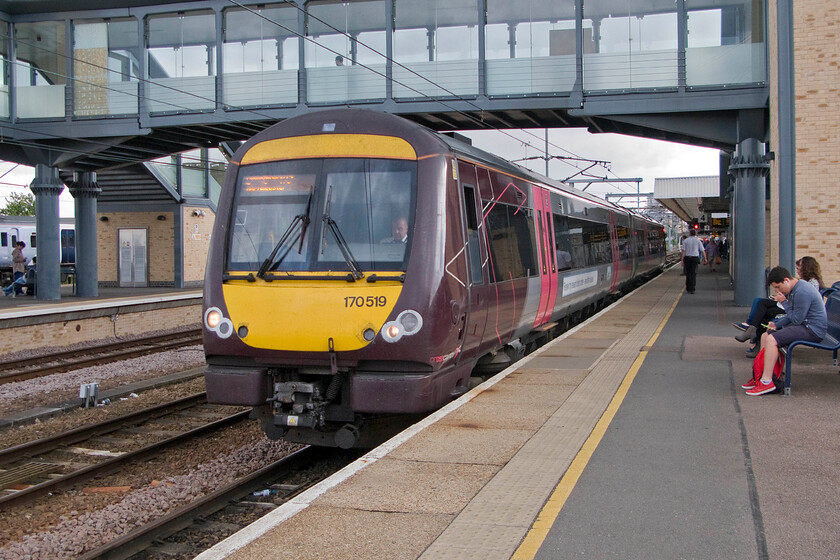 170519, XC 15.27 Stansted Airport-Birmingham New Street (1N61), Cambridge station 
 CrossCountry's 15.27 Stansted Airport to Birmingham New Street service pauses at Cambridge station. The service is being worked by 170519 that is seen on Cambridges four hundred and seventy metre long platform four and one that is divided in the centre at the point where there is a scissor crossover. 
 Keywords: 170519 15.27 Stansted Airport-Birmingham New Street 1N61 Cambridge station