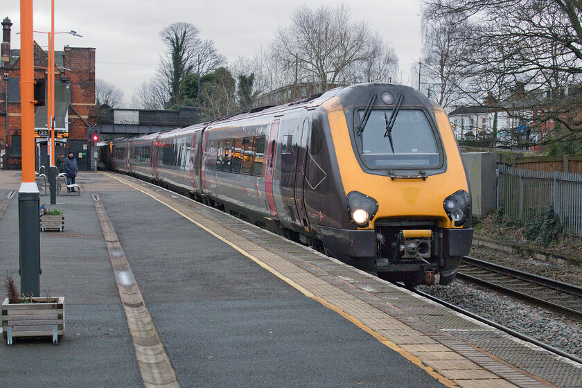 220021 & 221141, XC 06.45 York-Plymouth (1V46, RT), Water Orton station 
 Voyagers 220021 and 221141 pass at a fairly sedate pace through Water Orton station being checked by a signal at caution for Water Orton's West Junction. The CrossCountry Voyagers were working the 06.45 York to Plymouth 1V46 service. 
 Keywords: 220021 221141 06.45 York-Plymouth 1V46 Water Orton station CrossCountry Voyager