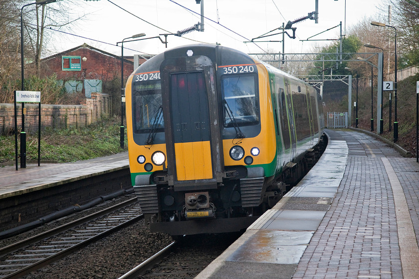 350240, LN- 14.01 Walsall-Wolverhampton (2W34, 2L), Smethwick Rolfe Street station 
 London North Western/West Midlands Trains 350240 rolls into Smethwick Rolfe Street station with the 14.01 Walsall-Wolverhampton working. Whilst not the most dynamic and exciting EMUs, theses class 350 are almost the most reliable units on the national network. At the time of writing, in mid 2018, it a slightly bizarre prospect that the 350/2s have an uncertain future when they come of lease soon with the very real possibility that they will go into store. 
 Keywords: 350240 2W34 Smethwick Rolfe Street station