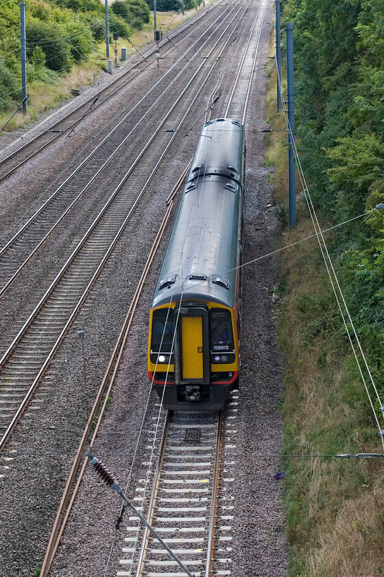 158813, EM 09.57 Norwich-Liverpool Lime Street (1R78), Westby SK962271 
 The 1R78 09.57 Norwich to Liverpool Lime Street service reaches the top of Stoke bank on the down slow line worked by 158813. These units are worked hard on these inter-regional services but do they provide adequate transportation for the passengers on these routes? 
 Keywords: 158813 09.57 Norwich-Liverpool Lime Street 1R78 Westby SK962271 East Midlands Trains