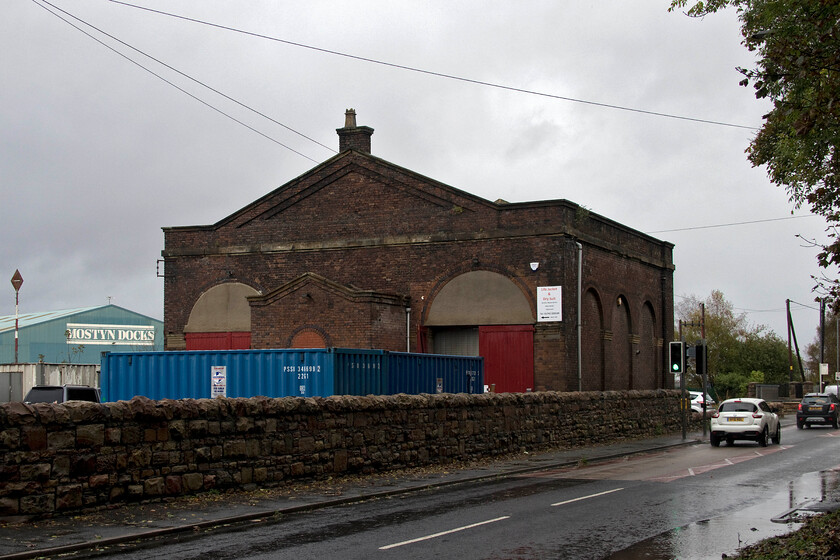 Former goods shed, Mostyn 
 The former goods shed at Mostyn still stands and is in use by business. In the background is a large warehouse that is part of the small Mostyn Docks complex that is one of the oldest ports in the country still in use. Today it is the home to a number of industries associated with the off-shore wind energy industry. 
 Keywords: Former goods shed Mostyn