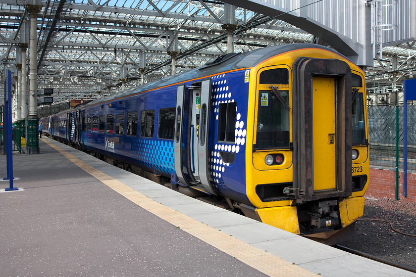 158723, 12.24 Edinburgh Waverley-Tweedbank (2T82), Edinburgh Waverley station 
 158723 sits in the afternoon sunshine at Edinburgh Waverley about to work the 12.24 to Tweedbank. This was the train that I took along the length of the Borders Railway that opened just over a year ago in September 2015. 
 Keywords: 158723 Edinburgh Waverley-Tweedbank 2T82 Edinburgh Waverley station