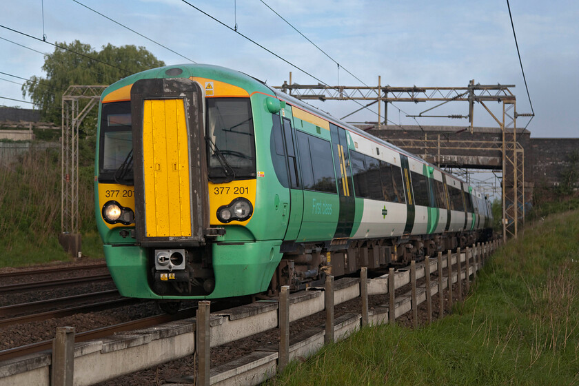 377201, SN 07.13 Milton Keynes Central-East Croydon (2O19, RT), Old Linslade 
 Southern Electrostar 377201 heads past Old Linslade between Bletchley and Leighton Buzzard working the 07.13 Milton Keynes to East Croydon Southern service. When wishing to cross the capital or visit West London my wife and I use these Southern services finding them perfect as they stop at places such as Kensington Olympia but as they do not run back to Milton Keynes on Sundays return journeys usually require an inconvenient change of trains at Watford Junction. 
 Keywords: 377201 07.13 Milton Keynes Central-East Croydon 2O19 Old Linslade Southern Electrostar