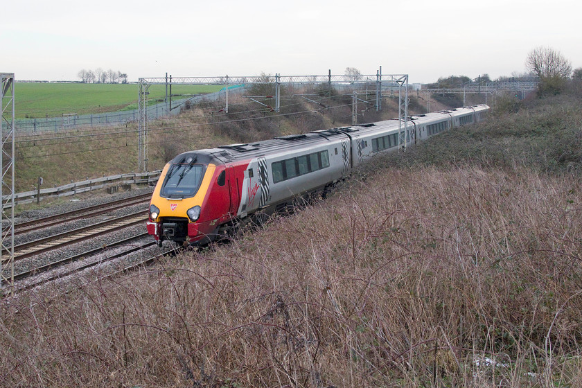 Class 221, VT 13.10 London Euston-Chester (1D87, 6L), Castlethorpe SP800440 
 An unidentified class 221 approaches Castlethorpe in north Buckinghamshire working the 13.10 Euston to Chester. Unlike the previous Chester working, about an hour earlier, this one completed its journey! 
 Keywords: Class 221 13.10 London Euston-Chester 1D87 Castlethorpe SP800440