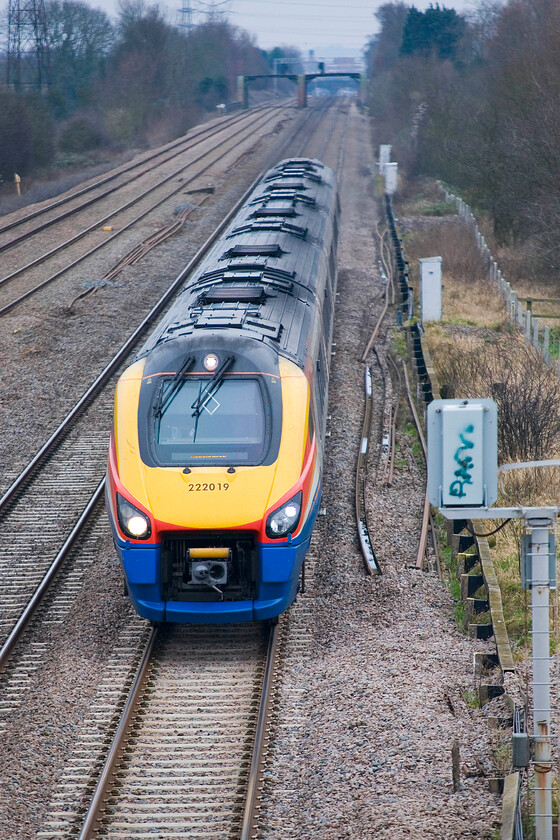 222019, EM 12.30 London St. Pancras-Nottingham, Lower Farm Road, Bromham TL028518 
 A portrait of a Meridian in full flight! After passing Bedford 222019 is building up to line speed for the climb of Sharnbrook bank, a five-mile climb with lengthy gradients of around 1:120. Modern diesel units have no real problems with this accent but in steam days crews had to work their locomotives hard to keep up to speed. The meridian is working the 12.30 St. Pancras to Nottingham EMR service. 
 Keywords: 222019 12.30 London St. Pancras-Nottingham Lower Farm Road Bromham TL028518 EMR East Midlands Railway Meridian