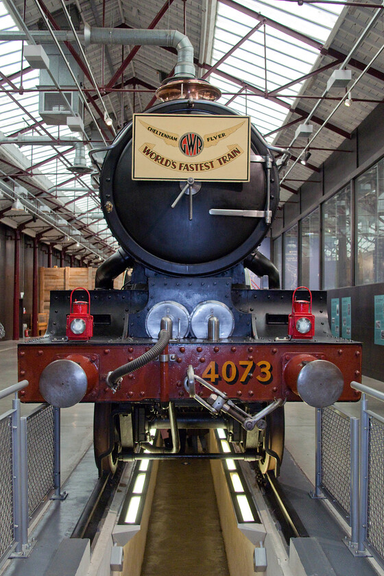 4073, on display, Steam Museum, Swindon 
 As part of the national collection 4073 'Caerphilly Castle' would be expected to be found at York's NRM but it is far more at home just adjacent to the GWML in Swindon's Steam museum. The 2-6-0 Castle was the lead locomotive of this class entering service in 1924 after being exhibited at the British Empire Exhibition, which was held at Wembley Park. It saw thirty-seven years of service on the Great Western network before being handed over to the Science museum by, of all people Dr. Richard Beeching! Notice the walkway underneath the locomotive allowing visitors an interesting view of the workings that were being enjoyed by many school children on the day of our visit. 
 Keywords: 4073 Steam Museum Swindon Caerphilly Castle Castle Class