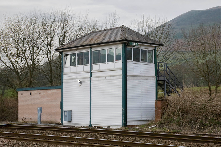 Edale signal box (Midland, 1893) 
 Edale signal box was refurbished in 2005 with the work completed changing its appearance considerably. Apart from the cloaking of the wooden Midland 1893 structure with UPVC the windows have been replaced with sealed units that bear no resemblance at all to the original nine pane sliding frames. The roof has been replaced but unfortunately, the finials were not returned. Whilst I bemoan the work done to the box, I must applaud the efforts made in order to make it more environmentally efficient and to improve the working conditions for the railway staff. 
 Keywords: Edale signal box