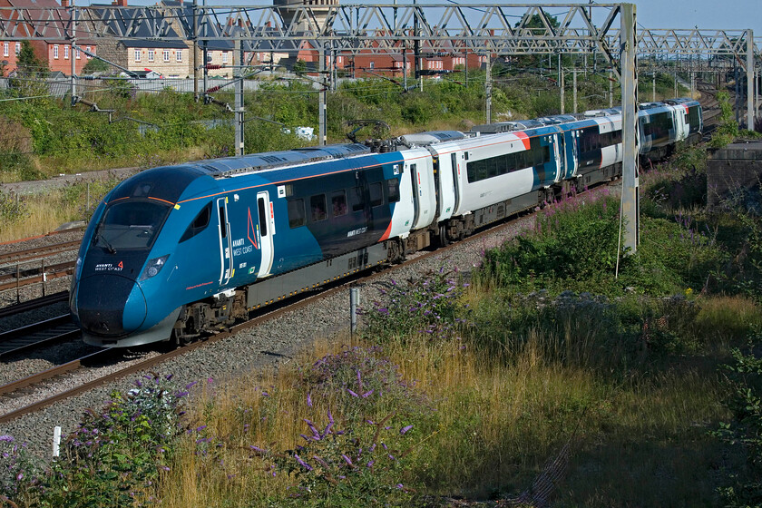 805001, VT 16.36 London Euston-Crewe (3K97, 5E), site of Roade station 
 I am not quite sure why Avanti is operating this 3K97 empty stock move but it is now a regular train through Roade in the early evening. 805001 is seen passing the site of the old station as the 16.36 Euston to Crewe in some lovely evening summer sunshine. 
 Keywords: 805001 16.36 London Euston-Crewe 3K97 site of Roade station