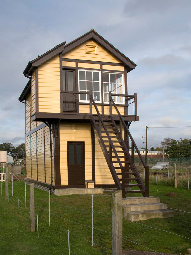 Wroxham signal box, preserved (GE, 1900) 
 Unfortunately, the former Wroxham signal box was closed to visitors on the day of our visit to the town using the Bure Valley Railway. The box has been rebuilt originally being a lot closer to the Network Rail tracks that can be seen beyond the fence to the right. The box is a former Great Eastern structure that was opened in 1900 that had a McKenzie and Holland fifty lever frame installed that had been considerably rationalised by the time closure came in June 2000. 
 Keywords: Wroxham signal box