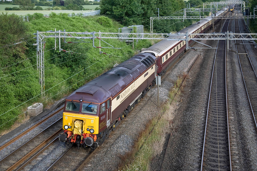 57305, return leg of British GP special, Milton Keynes-Soho-Milton Keynes-London Euston (1Z65), Victoria bridge 
 Having picked up some returning British Grand Prix fans at Milton Keynes 57305 'Northern Princess' leads the Northern Belle operated charter that is initially heading north as far as Soho in Birmingham. It would then head south again to Euston collecting any stragglers again at Milton Keynes to return them to London. Many would have been celebrating Lewis Hamilton's win ahead of his Mercedes teammate Nico Rosberg. 
 Keywords: 57305 British GP special Milton Keynes-Soho-Milton Keynes-London Euston 1Z65 Victoria bridge