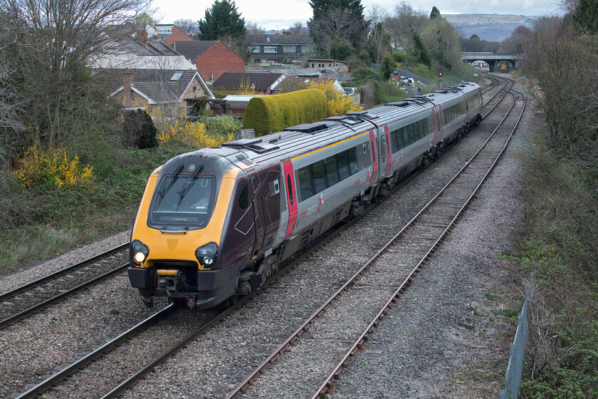 221141, XC 16.42 Birmingham New Street-Plymouth (1V61, RT), Cloddy bridge 
 The 1V61 16.42 Birmingham New Street to Plymouth CrossCountry service leaves Cheltenham past Cloddy bridge worked by 221141. The legacy of its Virgin CrossCountry times still is clear to see on the nose of the Voyager with the outline shape of the Virgin crest still evident and this is some fifteen years on from their operation of the units! 
 Keywords: 221141 16.42 Birmingham New Street-Plymouth 1V61 Cloddy bridge CrossCountry Voyager