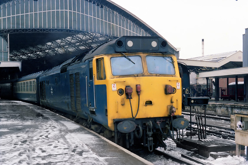 50002, unidentified up working, Bristol Temple Meads station 
 50002 waits at Bristol Temple Meads to leave with an unidentified up working. The weather conditions had caused some problems with the timetable and this meant that most services were difficult to identify. 50002 is still with us having survived into preservation. At the time of writing, it is undergoing a protracted restoration at the South Devon Railway. 
 Keywords: 50002 unidentified up working Bristol Temple Meads station