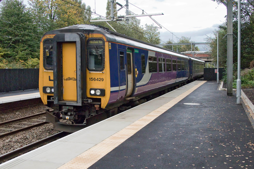 156429, NT 17.07 Manchester Victoria-Ellesmere Port (1D72, 2L), Eccles station 
 156429 passes through Eccles station forming the 17.07 Manchester Victoria to Ellesmere Port. As can be seen in this image, Eccles station platforms have recently been extended and resurfaced as part of a wider station improvement programme. The station has just two platforms of its original four. A loop line passes to the north of the station but it appeared to be rarely used. 
 Keywords: 156429 17.07 Manchester Victoria-Ellesmere Port 1D72 Eccles station