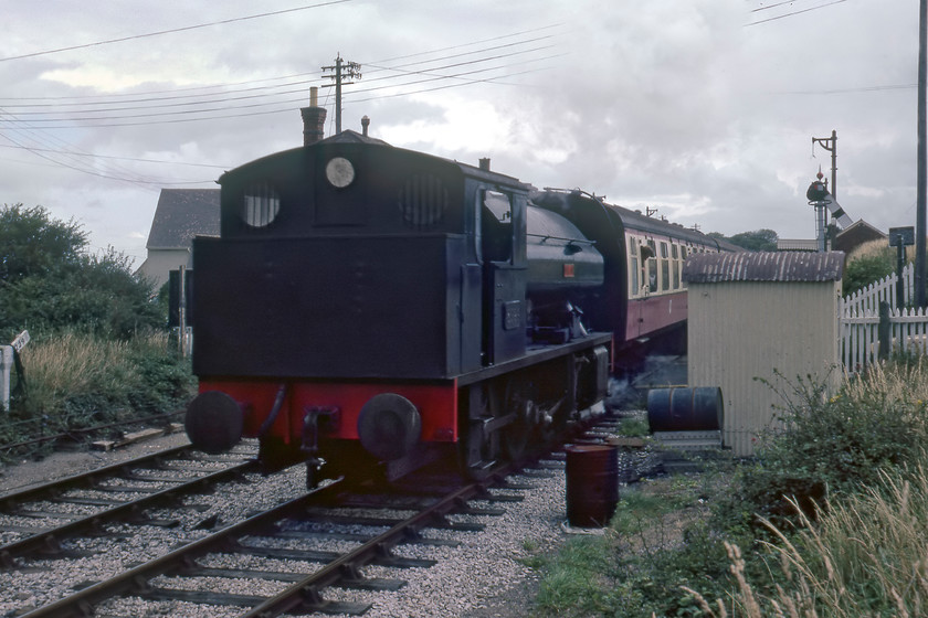 2996, 11.05 Blue Anchor-Minehead, Blue Anchor station 
 Bagnall 0-6-0 number 2996 'Victor' departs from Blue Anchor station with the return 11.05 to Minehead. I had just travelled to Blue Anchor on the outward working as the 10.35 ex Minehead. 2996 was built in 1951 (only twenty-nine years before this picture was taken) for the Steel Company of Wales plant at Port Talbot and looks a little out of place in an otherwise classically GW scene. 
 Keywords: 2996 11.05 Blue Anchor-Minehead Blue Anchor station