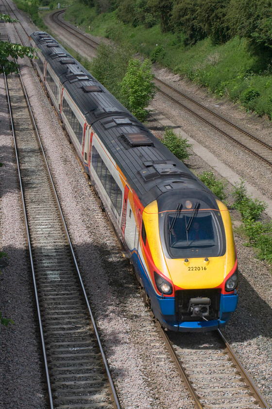 222016, EM 12.49 Sheffield-London St. Pancras (1C47), Glendon Road bridge SP855815 
 222016 is about to pass under Glendon Road bridge with the junction of the same name visible in the background curving off to the right towards Corby. The EMR Meridian is working the 12.49 Sheffield to St. Pancras service through a welcome patch of sunshine after what had been a dull June day. 
 Keywords: 222016 12.49 Sheffield-London St. Pancras 1C47 Glendon Road bridge SP855815 EMT East Midlands Trains Meridian