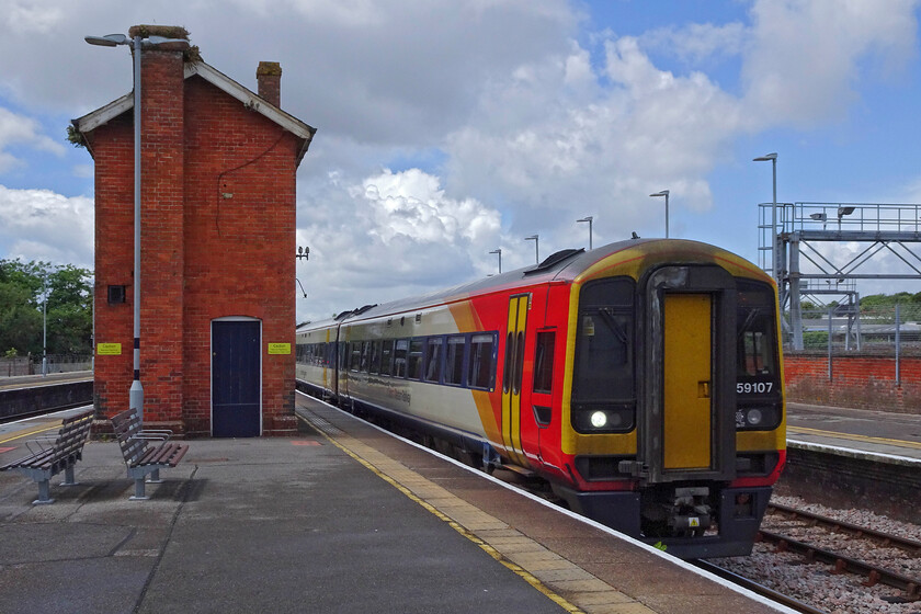 159107, SW 11.25 Exeter St. David's-London Waterloo (1L44, 3E), Salisbury station 
 159107 arrives at Salisbury station working the 11.25 Exeter to Waterloo service. It is passing a very odd structure purported by some to be a former signal box but I have yet to see or read any actual evidence of this. 
 Keywords: 159107 11.25 Exeter St. David's-London Waterloo 1L44 Salisbury station