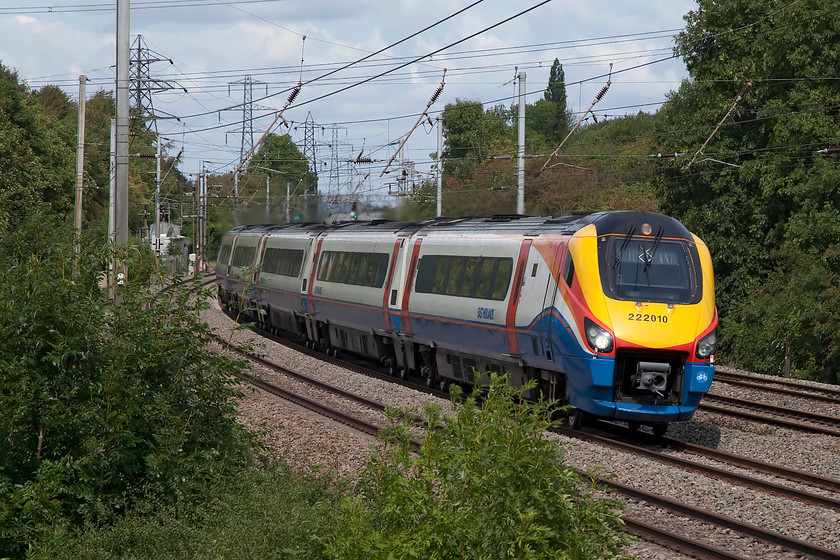 222010, EM 12.41 Corby-London St. Pancras (1P40, 2L), Sundon TL035269 
 222010 catches the afternoon sun as it heads south past Sundon in Bedfordshire with the 12.41 Corby to London St. Pancras. This is a complex scene caused by the multitude of power lines both for the railway and the high voltage transmission wires in the background emanating from a substantial Sundon sub-station. 
 Keywords: 222010 1P40 Sundon South Junction TL035269