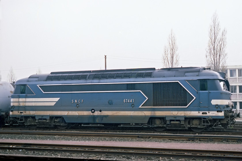 67441, tanker train, Nantes 
 SNCF class BB 67441 waits at Nantes station with a tanker train that had probably linked to the extensive docks at nearby St. Nazzaire. These large B'B' locomotives were built between 1969 and 1975 and, at the time of writing in 2018 are still in service throughout the SNCF network on both freight and passenger duties. 
 Keywords: 67441 tanker train Nantes