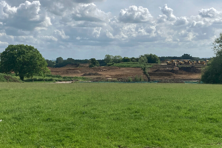 HS2 under construction, Newton Purcell SP631311 
 Whilst I am a fan of HS2 I cannot help feeling a little edgy about its construction when I see scenes like this! This photograph was taken at Newton Purcell in Oxfordshire and looks roughly south showing the preparation of the ground for the line that will go from left to right between the trees. The environmental impact on the countryside, carbon emissions from the construction and the effect on residents affected by its construction are just for starters but I suppose that all these need to be seen in the context of its longer-term benefits. 
 Keywords: HS2 under construction Newton Purcell SP631311