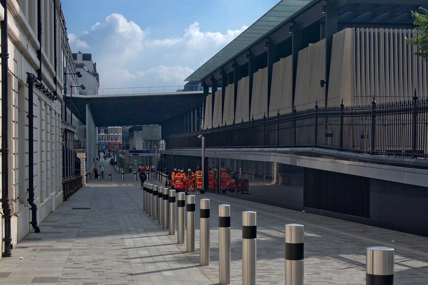 Eastbourne Terrace entrance, London Paddington station 
 The Crosrail Elizabeth Line has yet to open being now several years behind schedule. However, sections are completed but yet to be operational such is the case here at Paddington's Eastbourne Grove. The impressive entrance to the Crossrail station is seen complete with its glass roof that permits natural light to flood down to the concourse. When it eventually opens it will be part of a new and vital link that crosses London eventually linking up with a planned north to south Crossrail line...perhaps! 
 Keywords: Eastbourne Terrace entrance London Paddington station