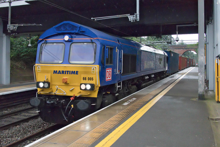 66005, 05.07 Southampton Western Docks-Masborough (4E94), Lea Hall station 
 66005 'Maritime Intermodal One' brings the 05.07 Southampton Western Docks to Masborough Freightliner through Lea Hall station. 66003 was one of the first class 66s to arrive in the UK during August 1998. In its latest reincarnation, the re-paint and re-branding have freshened it up and, along with six other members of the class, it is now working hard, now for Maritime Transport, a British operator based in Felixstowe. 
 Keywords: 66005 05.07 Southampton Western Docks-Masborough 4E94 Lea Hall station