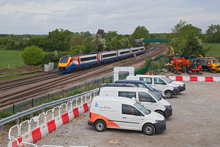 222015, EM 09.16 Corby-London St.Pancras (1P24, 4L), Templars Way Bridge, Sharnbrook 
 222015 '175 Years of Derby's Railways 1839 - 2014' passes a trackside temporary work site at Sharnbrook Junction in Bedfordshire working the 09.16 Corby to St. Pancras. The Carillion work site was home to a team that were preparing the line for the forthcoming electrification that it was announced would be completed to Kettering and Corby by 2019; we'll see? 
 Keywords: 222015 1P24 Templars Way Bridge, Sharnbrook