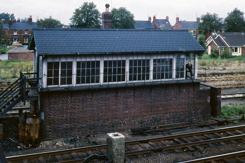 Spalding No. 2 signal box (GN, 1920) 
 A little photographed signal box was Spalding No. 2 to the north of the station on the route to Sleaford. It was built relatively late in 1920 by the Great Northern as part of a rationalisation of signalling in the Spalding area whereby six boxes was reduced to just two. Notice the rather overgrown sidings in the background. For fifty-one weeks of the year, these would see very little or no use only to be packed with charter trains during the town's flower festival in early May an event that sadly took place for the last time in 2014. Notice the signalman keeping a careful eye on Graham and I as we take our photographs. Interestingly, the same character also features in another photograph of the box taken a year later also keeping an eye on the photographer on that occasion too, see..... https://www.flickr.com/photos/47422047@N07/17006342146 
 Keywords: Spalding No. 2 signal box