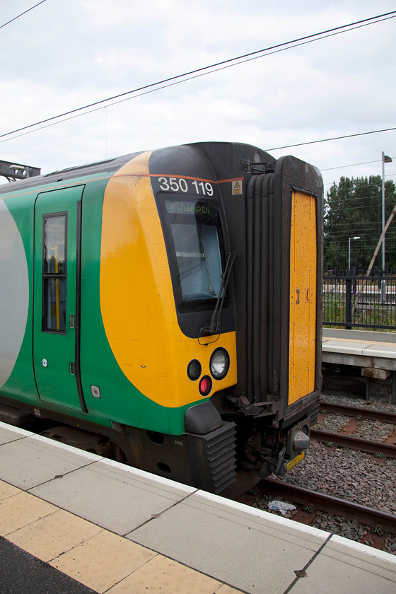 350119, LM 06.35 Northampton-Crewe (2U21, 1L), Northampton station 
 350119 sist at the end of Northampton remote bay platform with the 06.35 to Crewe. I travelled on this train as far as Stoke-on-Trent. 
 Keywords: 350119 2U21 Northampton station