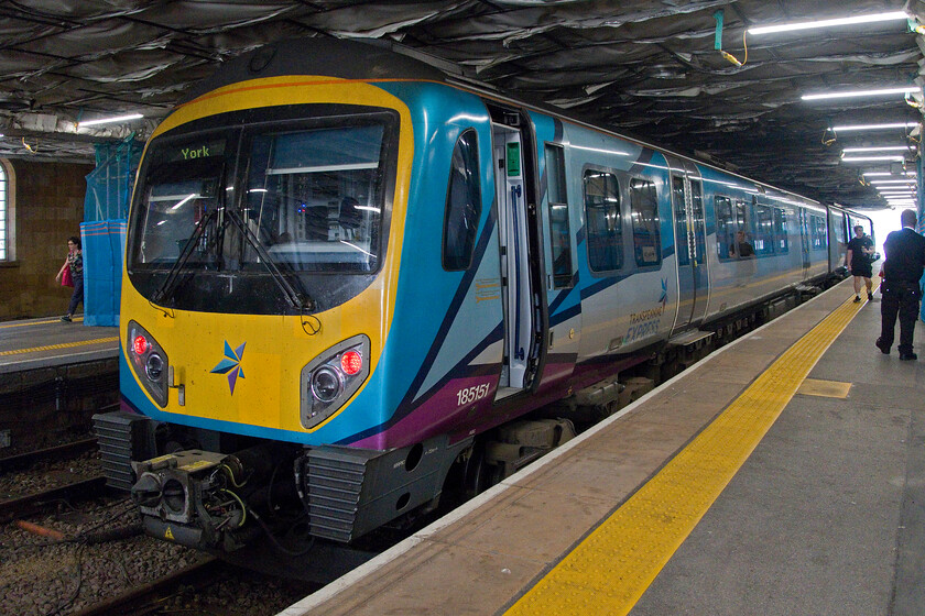 185151, TP 15.48 Scarborough-York (1U64, 2E), Scarborough station 
 With Scarborough station undergoing extensive renovation, it felt a little claustrophobic with the contractors having installed an access scaffold structure at a height only just above the roofs of the trains! 175151 will soon work the 1U64 15.48 'shuttle' service to York. 
 Keywords: 185151, TP 15.48 Scarborough-York 1U64 Scarborough station TPE Trans Pennine Express