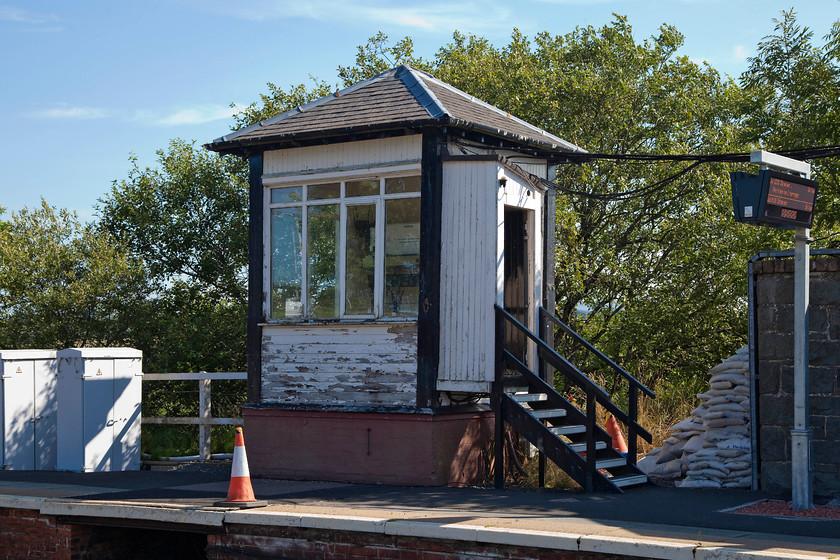 Barrhill signal box (GSW, 1935) 
 The diminutive signal box at Barrhill! Room only for one person to operate the levers in this former GSW box that was erected in 1935. It had previously been situated at Portpatrick and was brought to Barrhill to replace the previous Caledonian box that had been destroyed by a fire. In the adjacent station building is a very rare Tyer's Electric Tablet instrument that is also operated by the signalman. 
 Keywords: Barrhill signal box