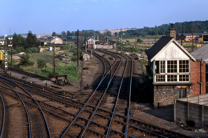 Pelham Street (GN, 1873) & Sinsil Bank (GN, 1882) signal boxes 
 Standing on Lincoln's Pelham bridge that acts an eastern relief road to the town and feast of former Great Northern Railway infrastructure is revealed. In the distance is Sinsal Bank signal box at the level crossing with Great Northern Terrace. The line branching off to the left in the centre lead to the railway depot and carriage sidings, indeed 31153 can just be seen stabled. This line still exists today leading to the now Network Rail facility. In the foreground is the rather run-down looking Pelham Street signal box, a Great Northern structure dating from 1882. The line crossing diagonally over the diamond crossings is now closed and has been lifted with just the twin curves seen here still in existence heading off towards Grimsby and Immingham via Market Rasen. The closed former Midland Railway route was often seen as Lincoln's mainline that went straight through the city with the rather grand Lincoln St.Marks station located slightly further south of the present station on the High Street. 
 Keywords: Pelham Street Sinsil Bank signal boxes Great Northern Railway GNR