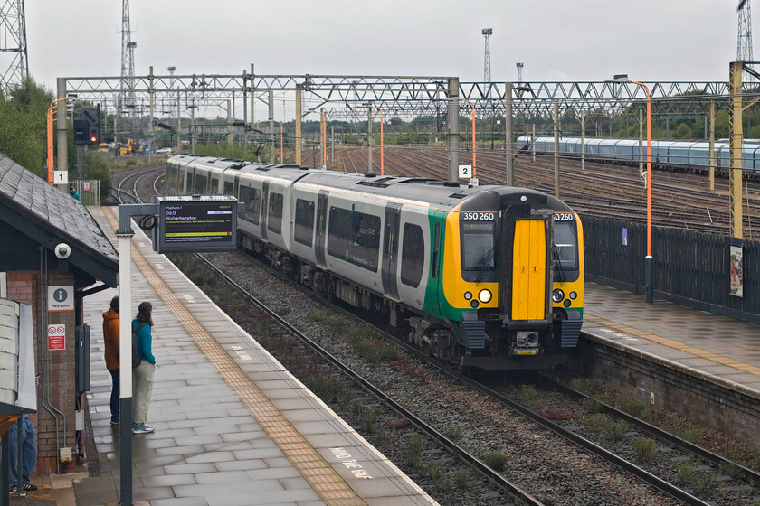 350260, LN 07.52 Birmingham International-Rugeley TV (Cancelled from Hendesford) (2H31, 28L), Bescot Stadium station 
 Running nearly half an hour late, 350260 passes through Besot Stadium station working the 07.52 Birmingham International to Rugeley Trent Valley service. Due to its late running, the train was terminated at Hendesford and returned as the balancing working running to time. Whilst this move got the timetable back to time again, what happens to the passengers at the stations beyond the cancellation point? 
 Keywords: 350260 07.52 Birmingham International-Rugeley TV Cancelled from Hendesford 2H31 Bescot Stadium station