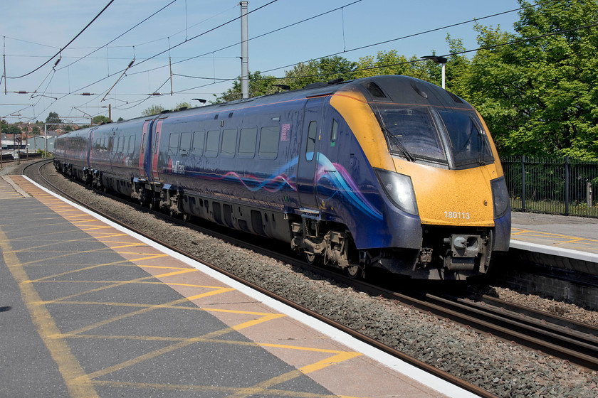 180113, HT 10.33 Hull-London King`s Cross (1A93, 2L), Grantham station 
 One of Hull Trains' notoriously unreliable class 180s enters Grantham station. 180113 is working the 10.33 Hull to King's Cross and is taken at an identical spot to a class 47 that I photographed during my 1978 Eastern Region railrover, see.... https://www.ontheupfast.com/v/photos/21936chg/25366323004/x47498-york-london-kings-cross-working . 
 Keywords: 180113 10.33 Hull-London King`s Cross 1A93 Grantham station