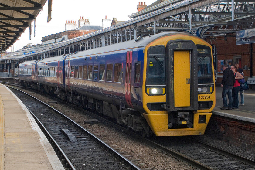 158954, GW 14.25 Portsmouth Harbour-Bristol Parkway (1F24), Salisbury station 
 The 1F24 14.24 Portsmouth Harbour to Bristol Parkway FGW service stands at Salisbury station. These units are perfectly capable working these inter-regional services replacing a rag-bag mixture of locomotive-hauled services in the late 1980s. 
 Keywords: 158954 14.25 Portsmouth Harbour-Bristol Parkway 1F24 Salisbury station FGW First Great Western