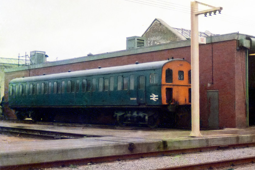 1301, Swindon Works 
 Awaiting overhaul at Swindon Works part of a Class 207 'East Sussex' unit. This is DTSO number S60900 which was from set 1301. This DEMU was withdrawn in April 1994 and cut-up.