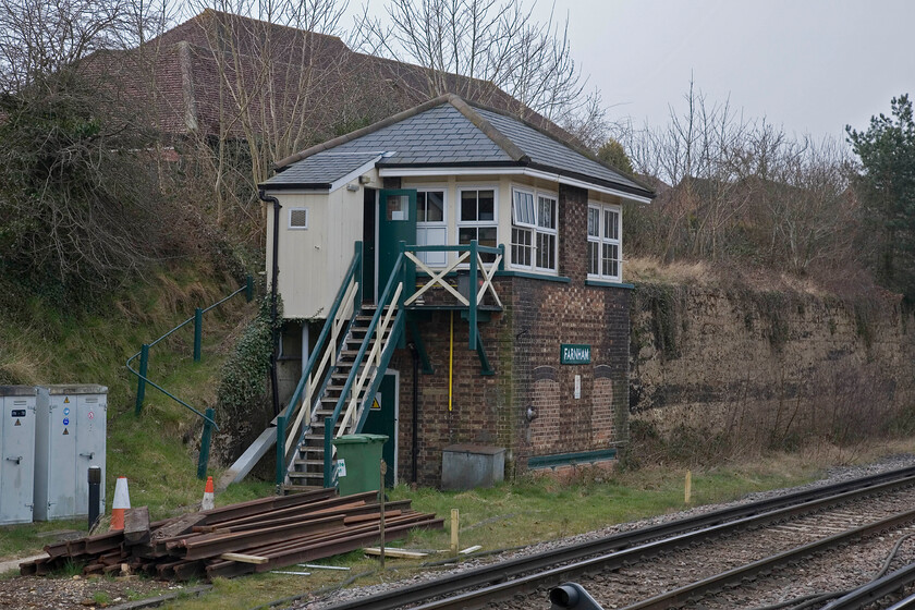 Farnham signal box (LSW, 1901) 
 Dating from 1901 Farnham signal box is to a classic London and South Western design with the added charm of an external personal needs block. It has been authentically painted and has a period nameboard. Whilst the windows have been changed for UPVC units that maintain the original glazing pattern. The box is due to close this summer along with Ash Vale and Aldershot (previously photographed on this trip) as part of the Sussex and Wessex Signalling Framework contract awarded to Atkins by Network Rail. Another piece of classic railway infrastructure is about to bite the dust! 
 Keywords: Farnham signal box LSW