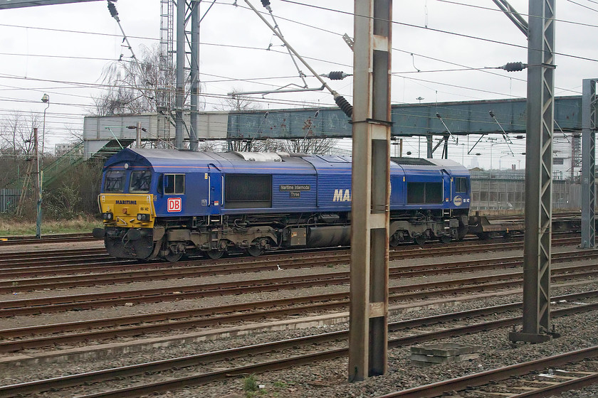 66142, 01.28 London Gateway-Wembley Yard-Trafford Park (4M83 & 84), Wembley yard 
 One of Maritime's Class 66s stands in Wembley Yard looking smart in the operator's blue livery. 66142 'Maritime Intermodal Three' is being held over at the front of the 4M83 01.28 London Gateway to Trafford Park. It arrived earlier in the morning and did not work forward until Monday morning as 4M84. Thanks again to Mike for the information from TOPS identifying what this working was. 
 Keywords: 66142 01.28 London Gateway-Wembley Yard-Trafford Park 4M83 4M84 Wembley yard Freightliner Maritime Intermodal Three