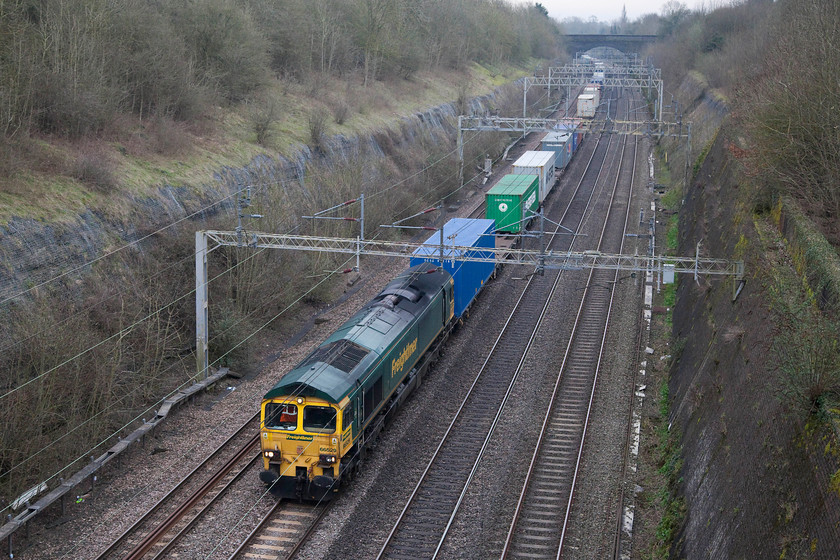 66529, 04.25 Felixstowe North-Lawley Street, Roade Cutting 
 Freightliner 66529 brings the 04.25 Felixstowe to Lawley Street (Birmingham) through Roade Cutting. 
 Keywords: 66529 Freightliner Roade Cutting