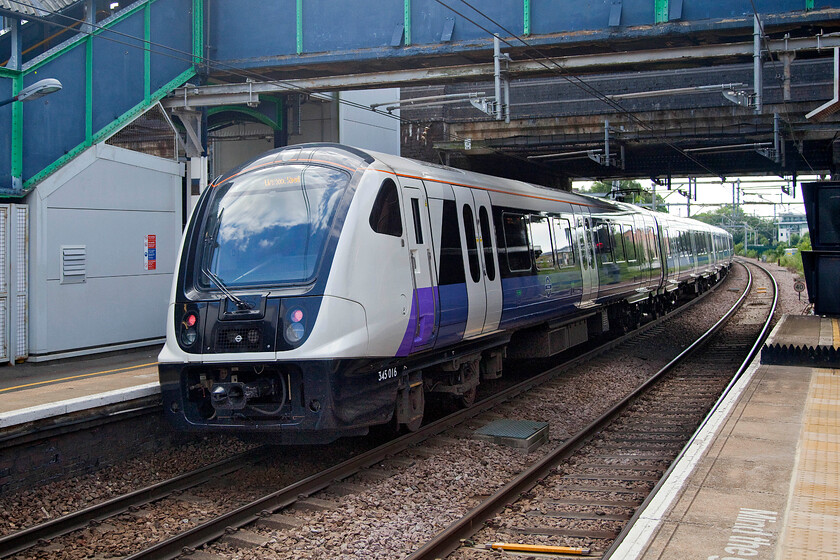 345017, XR 15.38 Shenfield-London Liverpool Street (2W95, RT), Brentwood station 
 After being permitted access to Shenfield station by the gate line staff the same things happened at Brentwood, a great double! 345017 leaves the station working the Crossrail 15.38 Shenfield to Liverpool street service. By 16.00 the station should be getting very busy with the early arrival home of commuters but COVID has put paid to that with very few passengers around and virtually empty trains. 
 Keywords: 345017 15.38 Shenfield-London Liverpool Street 2W95 Brentwood station Crossrail Aventra