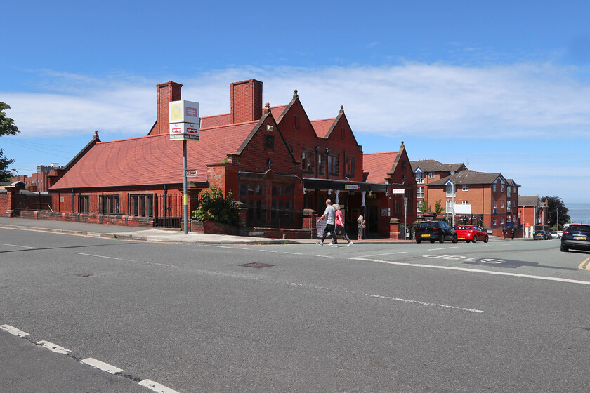 Frontage, New Brighton station 
 When I last visited New Brighton in 2021 it was on a Class 507 unit and the station building was encased in scaffolding and shrouded in plastic sheeting for extensive renovation. Today all that has gone to reveal a superb 1888 structure freshly restored in all its Victorian glory made even more impressive on this sunny and bright day. 
 Keywords: Frontage New Brighton station