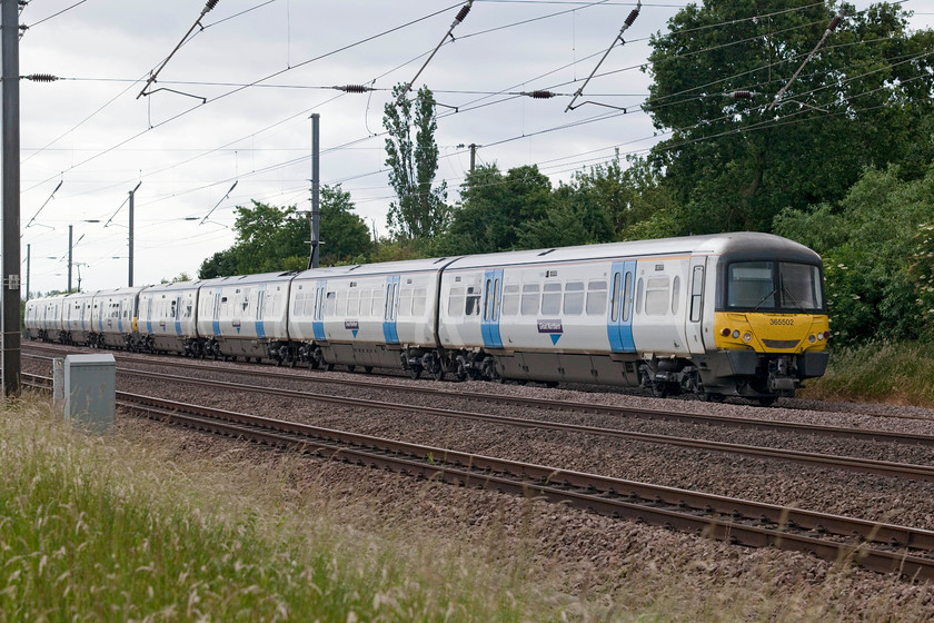 365502 & 365540, 15.15 London King`s Cross-Petreborough (1P42, RT), Offord D`Arcy TL213652 
 Great Northern 365502 and 365540 pass Offord D'Arcy forming the 15.15 London King's Cross to Peterborough local working. A significant number of these units have been moved away from this route due to the introduction of the class 700s. 
 Keywords: 365502 365540 1P42 Offord Darcy TL213652