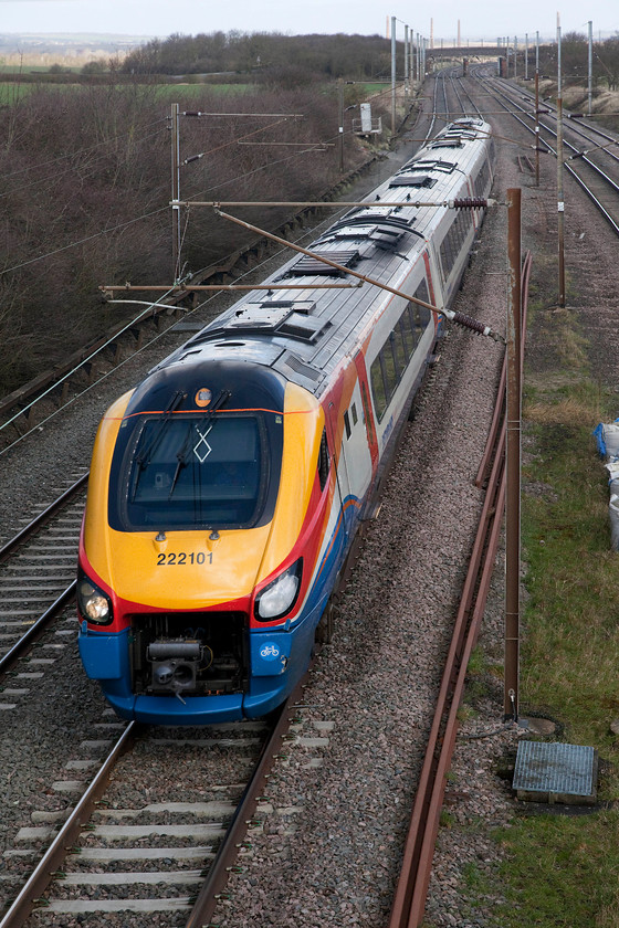 222101, EM 08.49 Sheffield-London St. Pancras (1C27, 4L), Park Road Bridge, Millbrook TL020390 
 With the sun just hiding behind a spring cloud, four-car 222101 heads south past Park Road Bridge between Bedford and Flitwick forming the 08.49 Sheffield to London St. Pancras. I really like the East Midlands Trains livery on both these Meridians and their HST brothers. It really makes then stand out in the landscape whatever the season and weather conditions. 
 Keywords: 222101 1C27 Park Road Bridge Millbrook TL020390