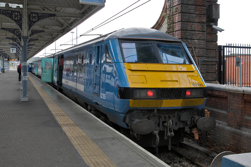 82105, LE 11.30 Norwich-London Liverpool Street, Norwich station 
 With a sea of light blue in evidence, the 11.30 departure from Norwich waits to leave for Liverpool Street. The Greater Anglia/ONE paint scheme is now redundant with some stock and units now appearing in the new white and red livery. 
 Keywords: 82105 11.30 Norwich-London Liverpool Street Norwich station Greater Anglia