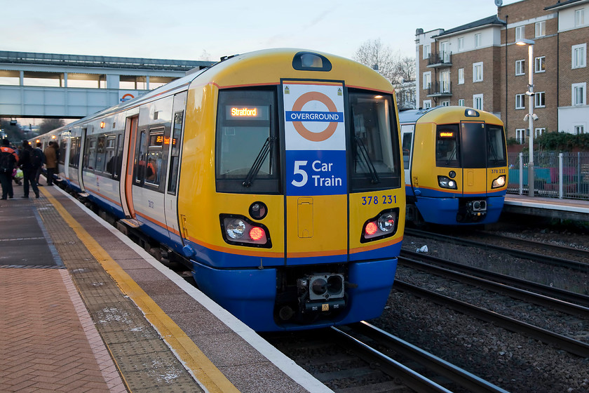 378231, LO 15.46 Clapham Junction-Stratford (2L72) & 378222, LO 15.05 Stratford-Clapham Junction (2Y57), Kensington Olympia station 
 I am always amazed at how busy Sunday afternoons are, particularly in the London area. Both 378231 and 378222 were pretty full to capacity as they stopped at Kensington Olympia station. The former was working the 15.46 Clapham Junction to Stratford and the latter the 15.05 Stratford to Clapham Junction. 
 Keywords: 378231 15.46 Clapham Junction-Stratford 2L72 378222 15.05 Stratford-Clapham Junction 2Y57 Kensington Olympia station