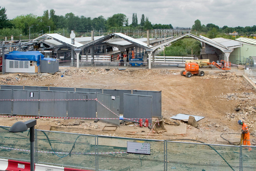 Demolition of old Northampton station 
 Work is now well advanced on the construction of the new taxi rank and turning circle at Northampton station. The three archways are all that remains of the Ray Moorcroft designed 'three cowsheds' of the 1966 rebuilt station. 
 Keywords: Demolition of old Northampton station